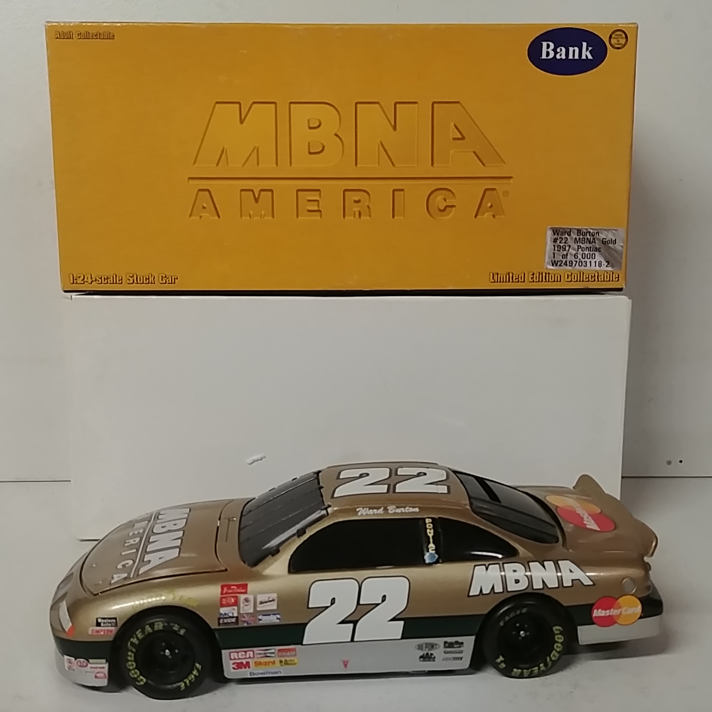 1997 Ward Burton 1/24th MBNA "Gold" b/w bank Pontiac