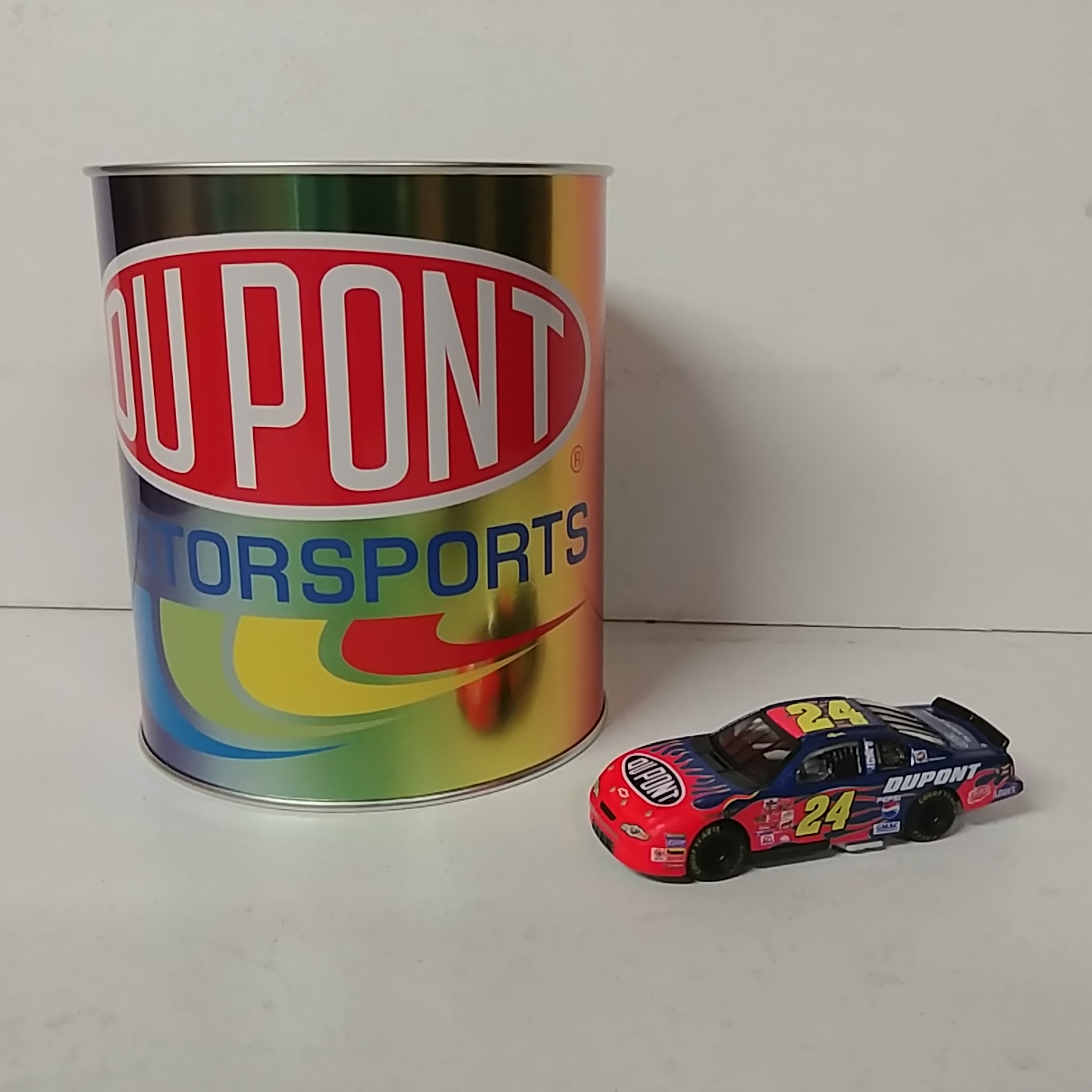 2002 Jeff Gordon 1/64th DuPont ARC in paint can Monte Carlo